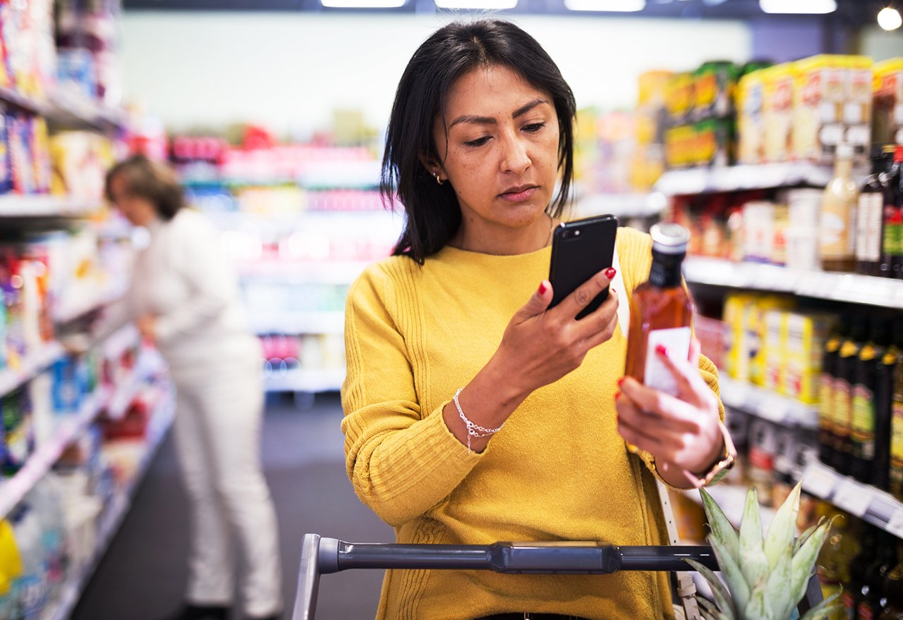 Woman Scanning Product Grocery Store Yuka App